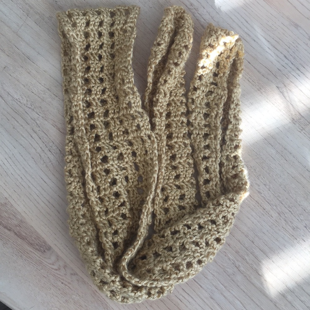 Gold, hand crocheted scarf.